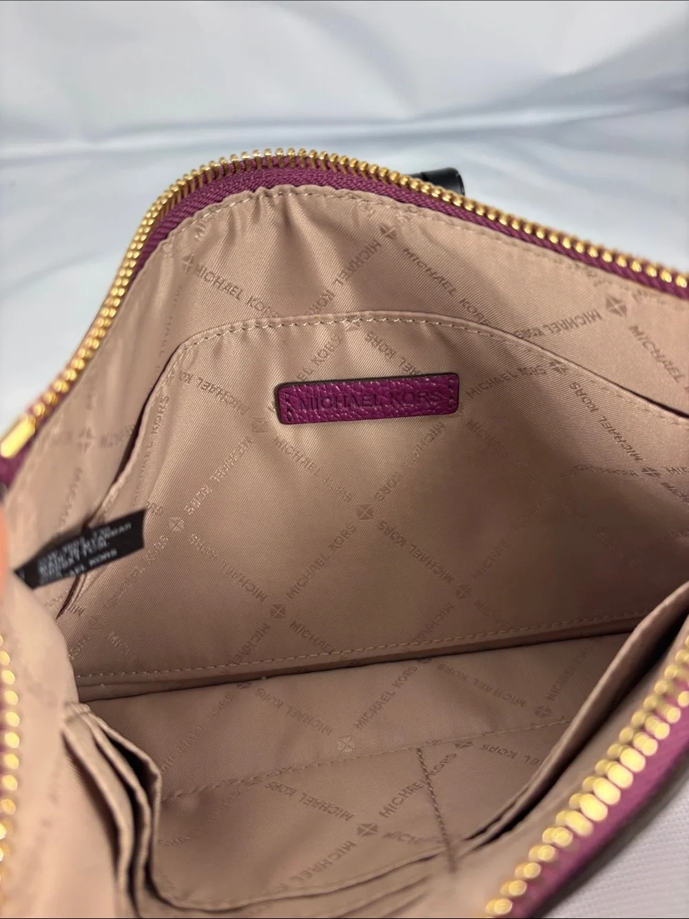 Michael Kors Magenta Pebbled Leather Wristlet Clutch with Gold Hardware